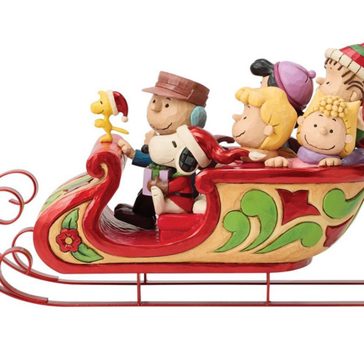 Estatua de Snoopy y sus amigos en un trineo: Por Jim Shore.