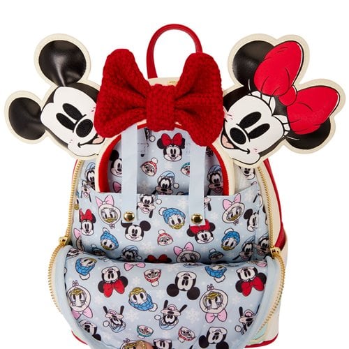 Mini mochila navideña de Mickey y Minnie Mouse patinando sobre hielo.